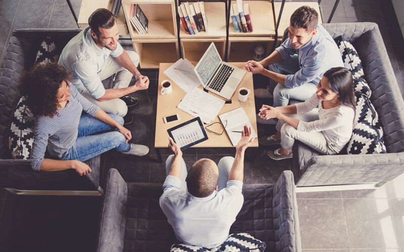eritas Software-Defined Storage for High Performance Applications Team collaborating in open office space