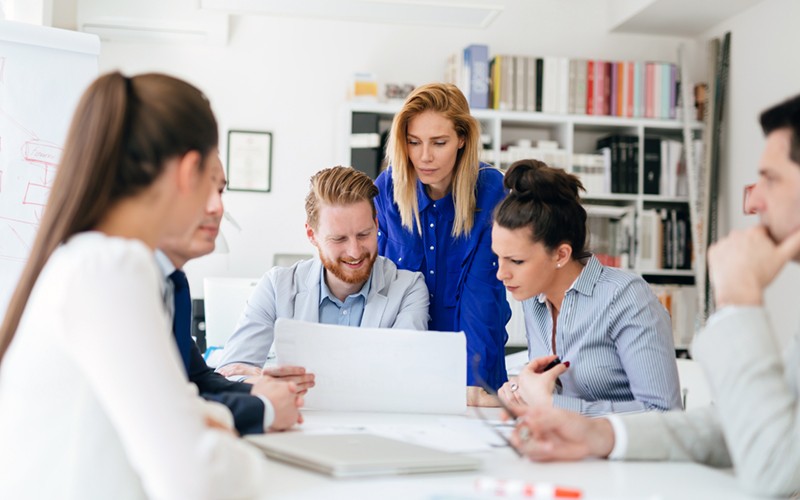 We have a comprehensive migration strategy Teammates gathered around to discuss migration strategy