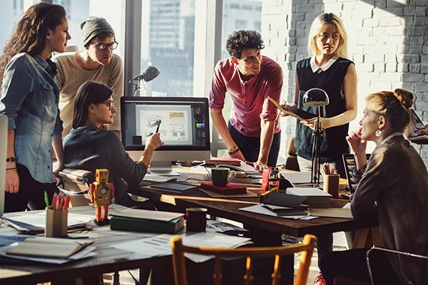 Explore the benefits of whitelabel services Business people smiling during a meeting