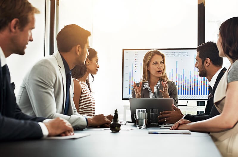 Our cloud experts have the broad knowledge Local government officials access data remotely during team meeting