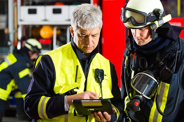 Firemen using a tablet