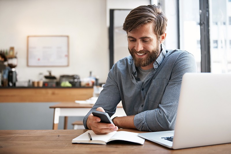 Purchase from anywhere Businessman working on laptop computer