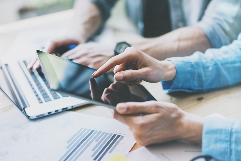 Focus less on \configuration of devices — and more on the people using them. Business professionals using multiple mobile devices to have a meeting