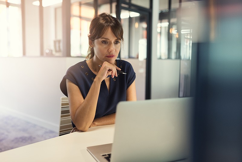 Software payment program Business woman reviews technology finance options