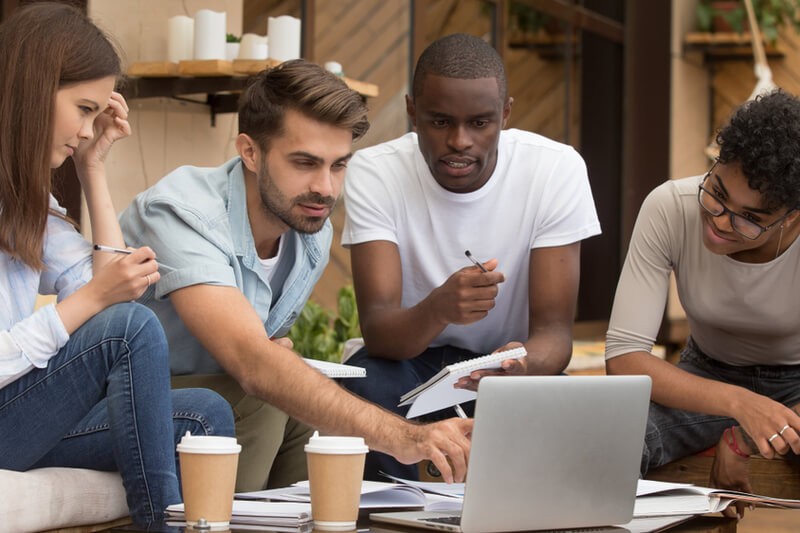 Manage your mobile workforce with ease. group of business colleagues use mobile device